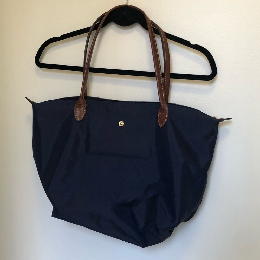 Lightly used navy blue longchamp